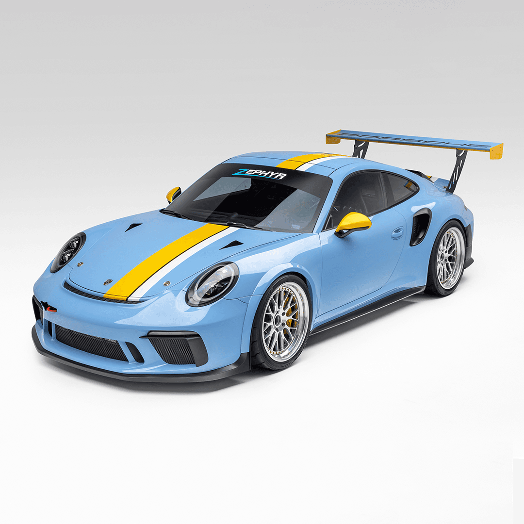 Blue and yellow striped vinyl wrap on a luxury vehicle