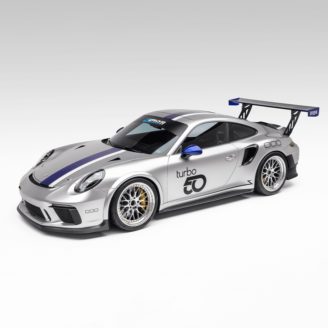 Silver and blue striped vinyl wrap on a luxury vehicle at side view